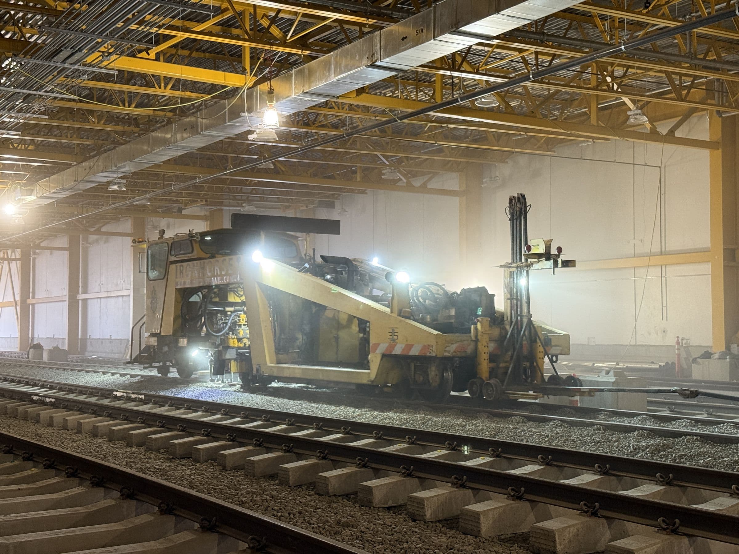 Track machine working inside the Haysboro LRT maintenance facility