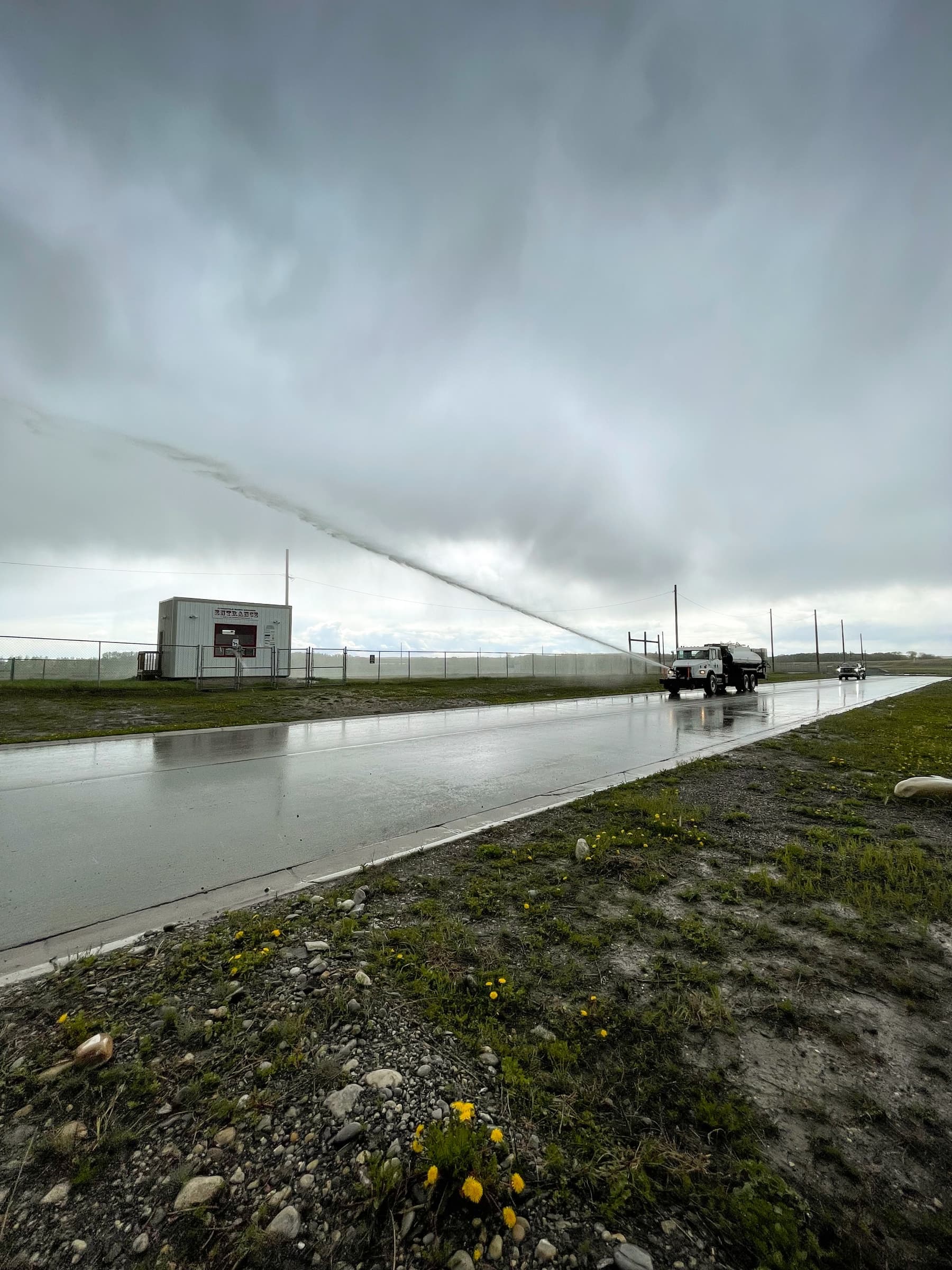 Water spray wetting the railway right of way